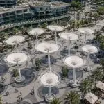 Custom architectural shade installation creating shaded public gathering spaces.