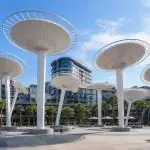 Custom architectural shade installation creating shaded public gathering spaces.