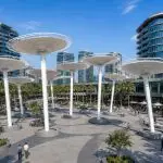 Custom architectural shade installation creating shaded public gathering spaces.
