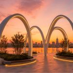Organic steel shade canopy designed for a luxury marina promenade.