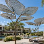 Luxury poolside sculptural canopy inspired by organic natural forms.