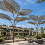 Luxury poolside sculptural canopy inspired by organic natural forms.