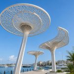 Organic steel shade canopy designed for a luxury marina promenade.