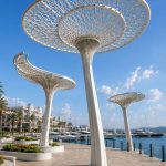 Organic steel shade canopy designed for a luxury marina promenade.