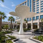 Florium sculptural architectural shade structure at a luxury five-star hotel entrance.