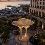Florium sculptural architectural shade structure at a luxury five-star hotel entrance.